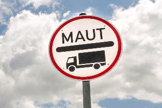 
A road sign indicating the toll requirement